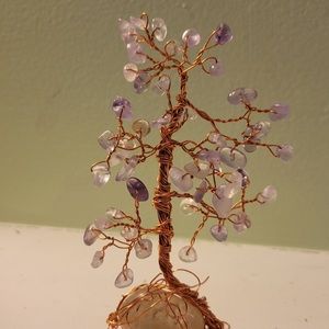 Crystal hand made amethyst tree of life with smoky quartz base.